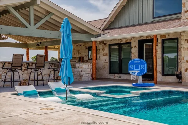 a front view of building with yard