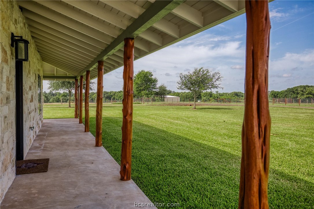 18581 William Penn Road Washington, TX 77880 - Photo 27 of 49 a view of a porch with a garden