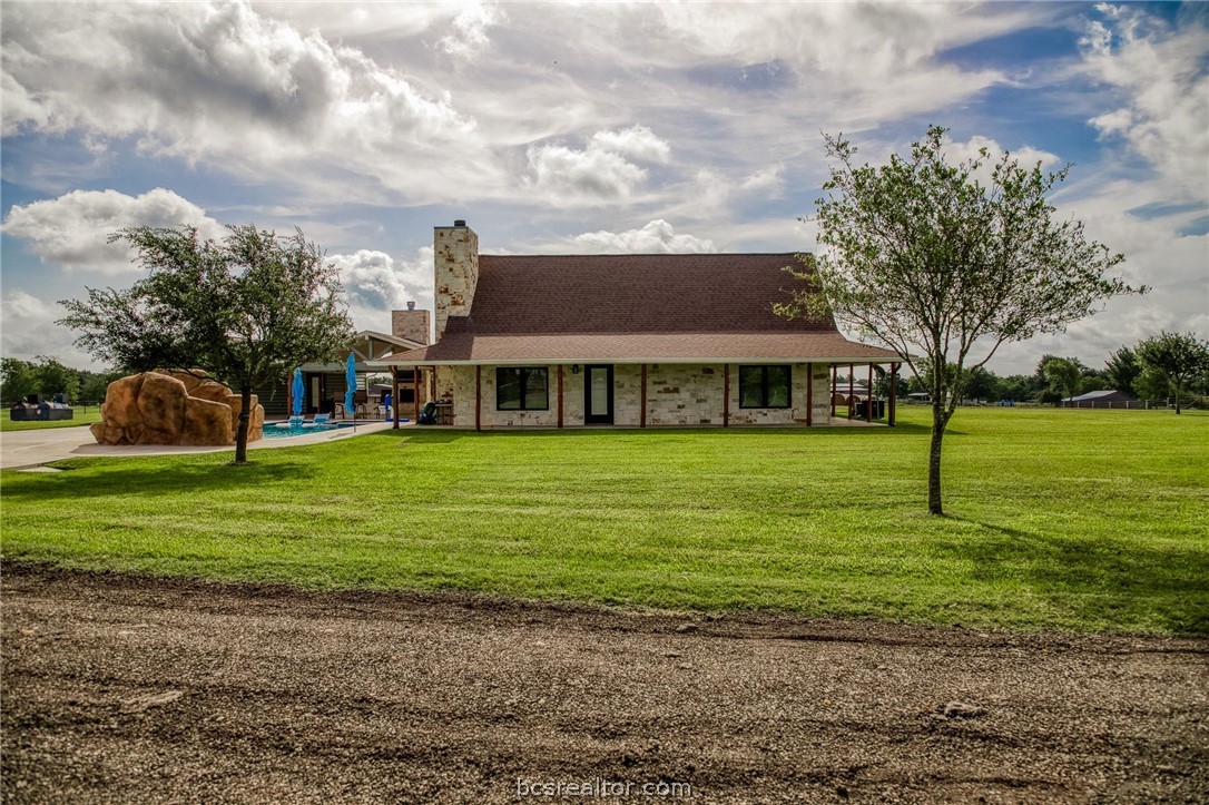 18581 William Penn Road Washington, TX 77880 - Photo 29 of 49 a view of a house with a yard