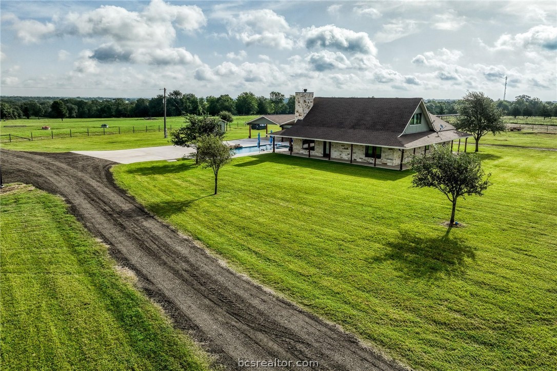 18581 William Penn Road Washington, TX 77880 - Photo 3 of 49 a view of a house with a big yard