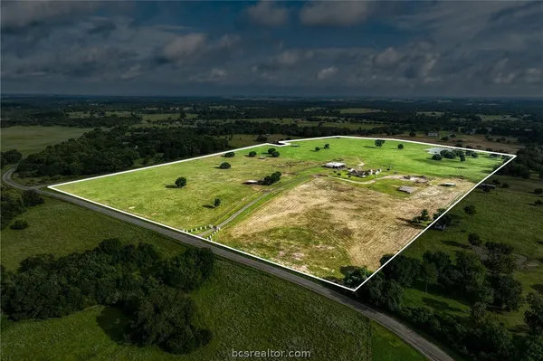 a view of a lake with a outdoor space