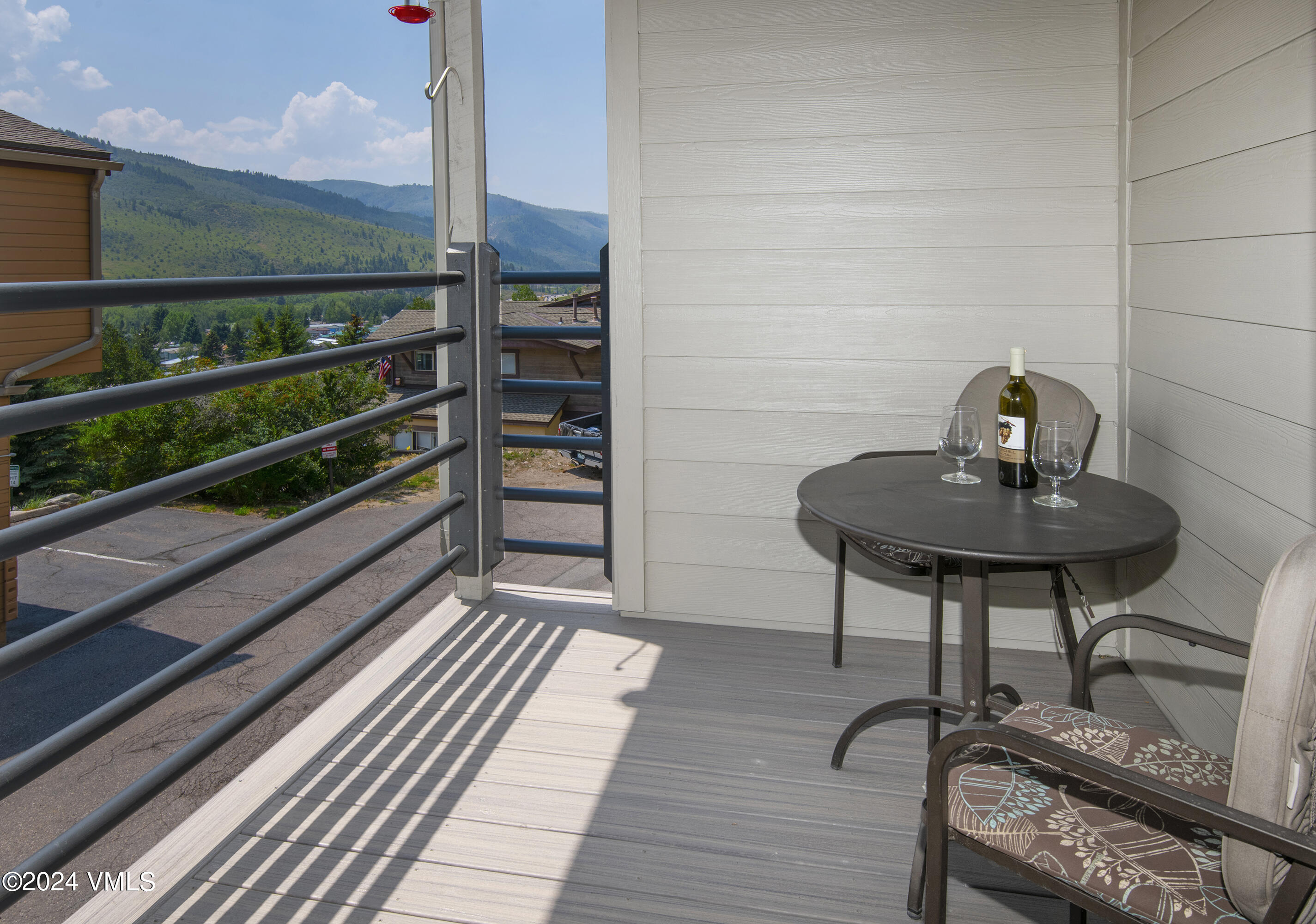 600 Nottingham Road, Unit 5 Avon, CO 81620 - Photo 2 of 13 a view of a balcony with chairs