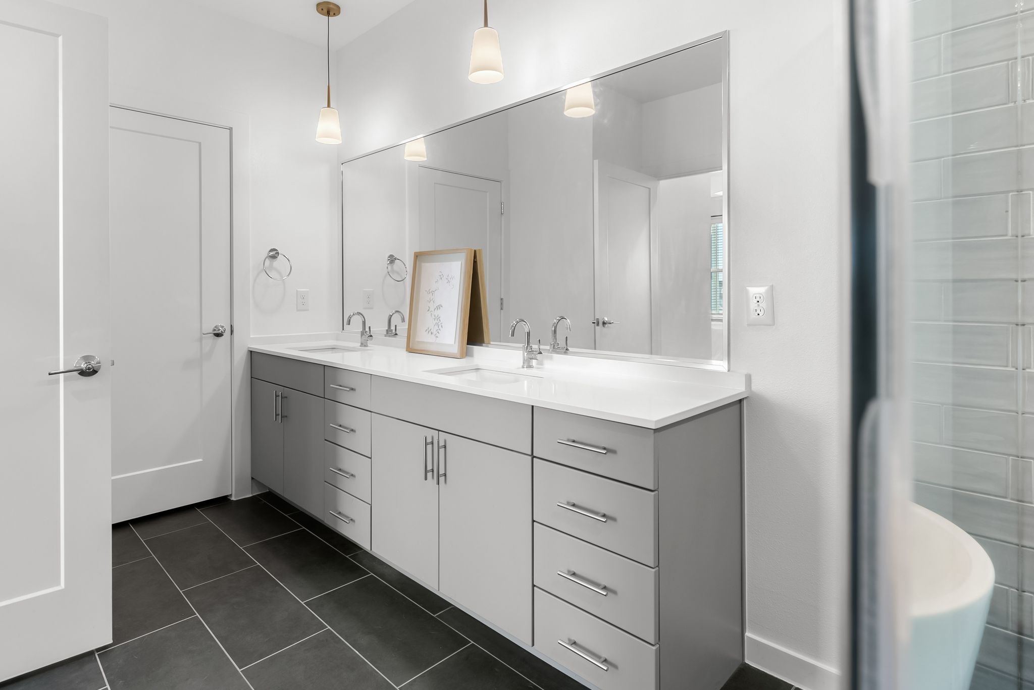 4801 Springdale Road, Unit 2410 Austin, TX 78723 - Photo 23 of 33 Primary bathroom enjoys a spa-like wet room with soaking tub and oversized shower.