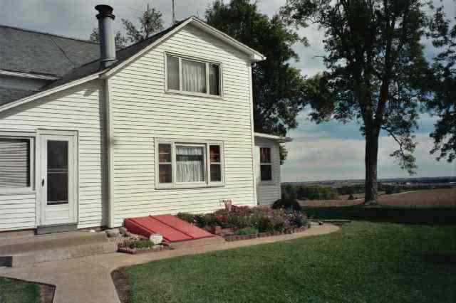 5138 Oakville Road Chadwick, IL 61014 - Photo 3 of 9 a view of a house with a yard
