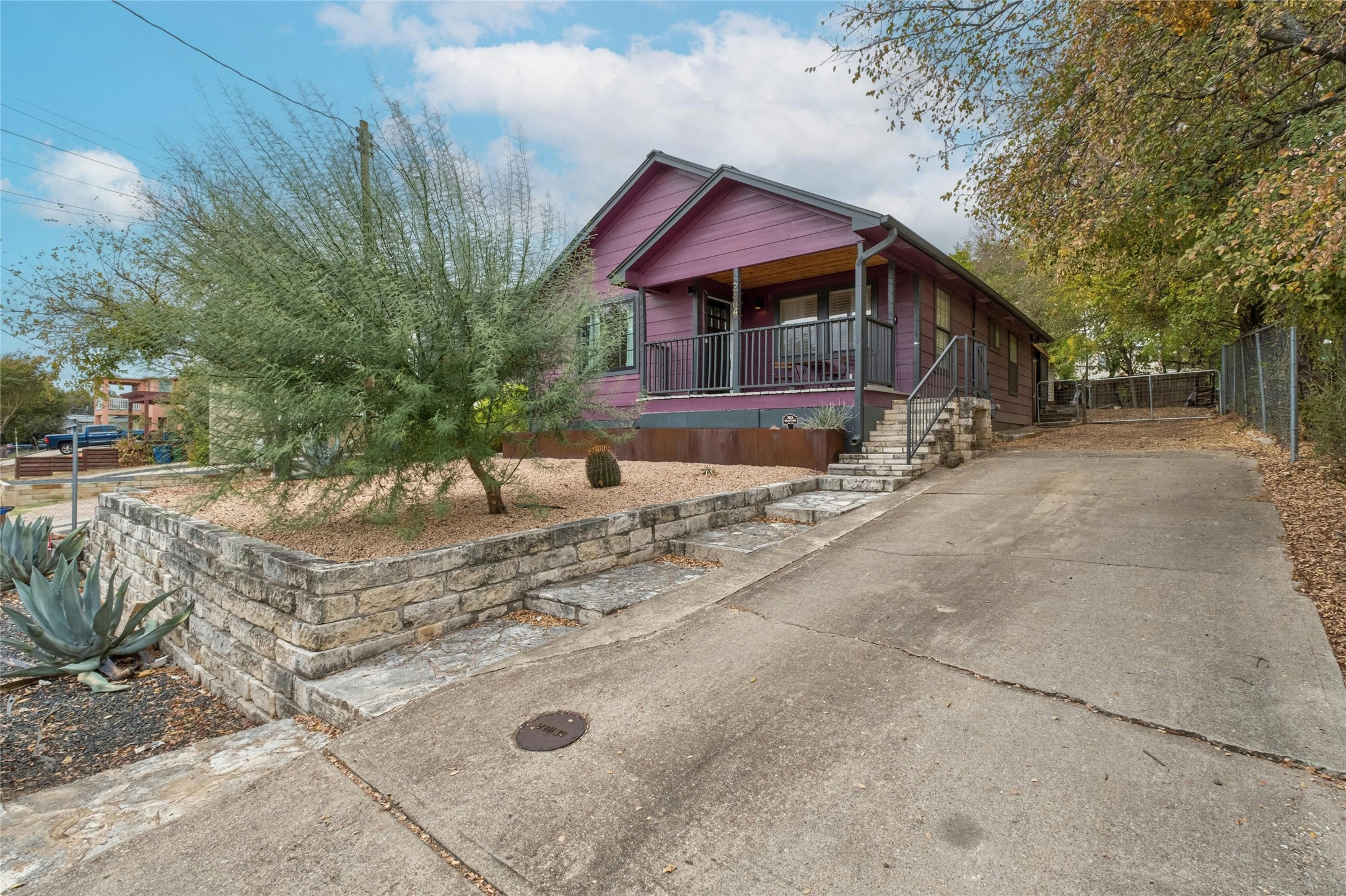 2804 Crest Avenue Austin, TX 78702 - Photo 16 of 16 a front view of a house with a yard