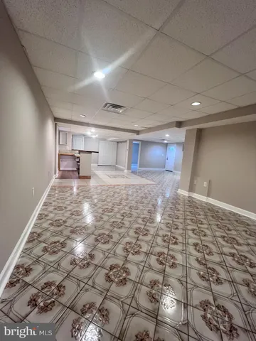 a kitchen with stainless steel appliances a refrigerator and a sink