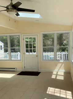 a view of an empty room with a window