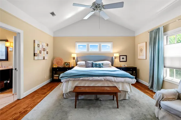 a bed room with a bed and a window