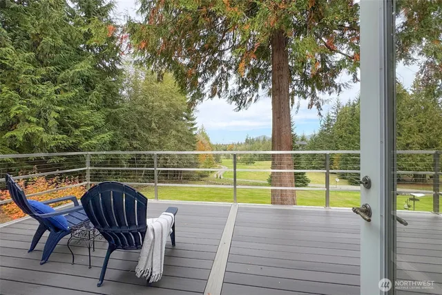 a view of a swimming pool with a lounge chair