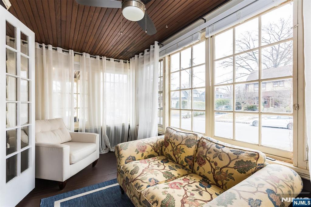 56 Walnut Crescent, Unit 1 Montclair, NJ 07042 - Photo 16 of 18 a bed sitting in a spacious bedroom next to a window