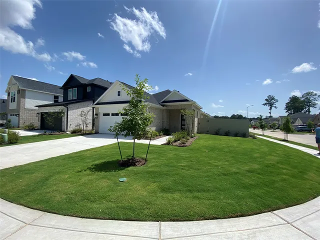 a house view with a garden space