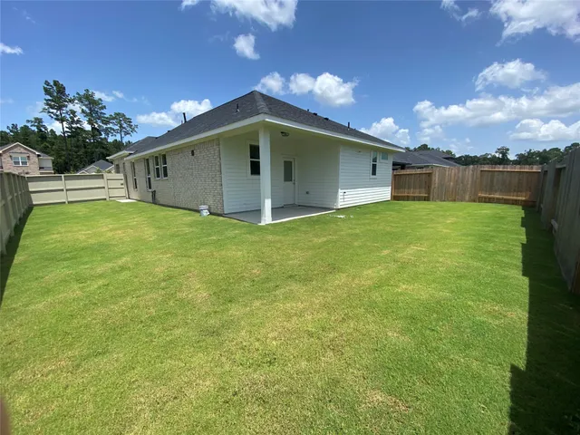 a house view with a garden space