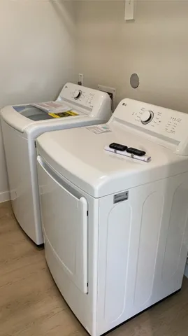 a utility room with dryer and washer