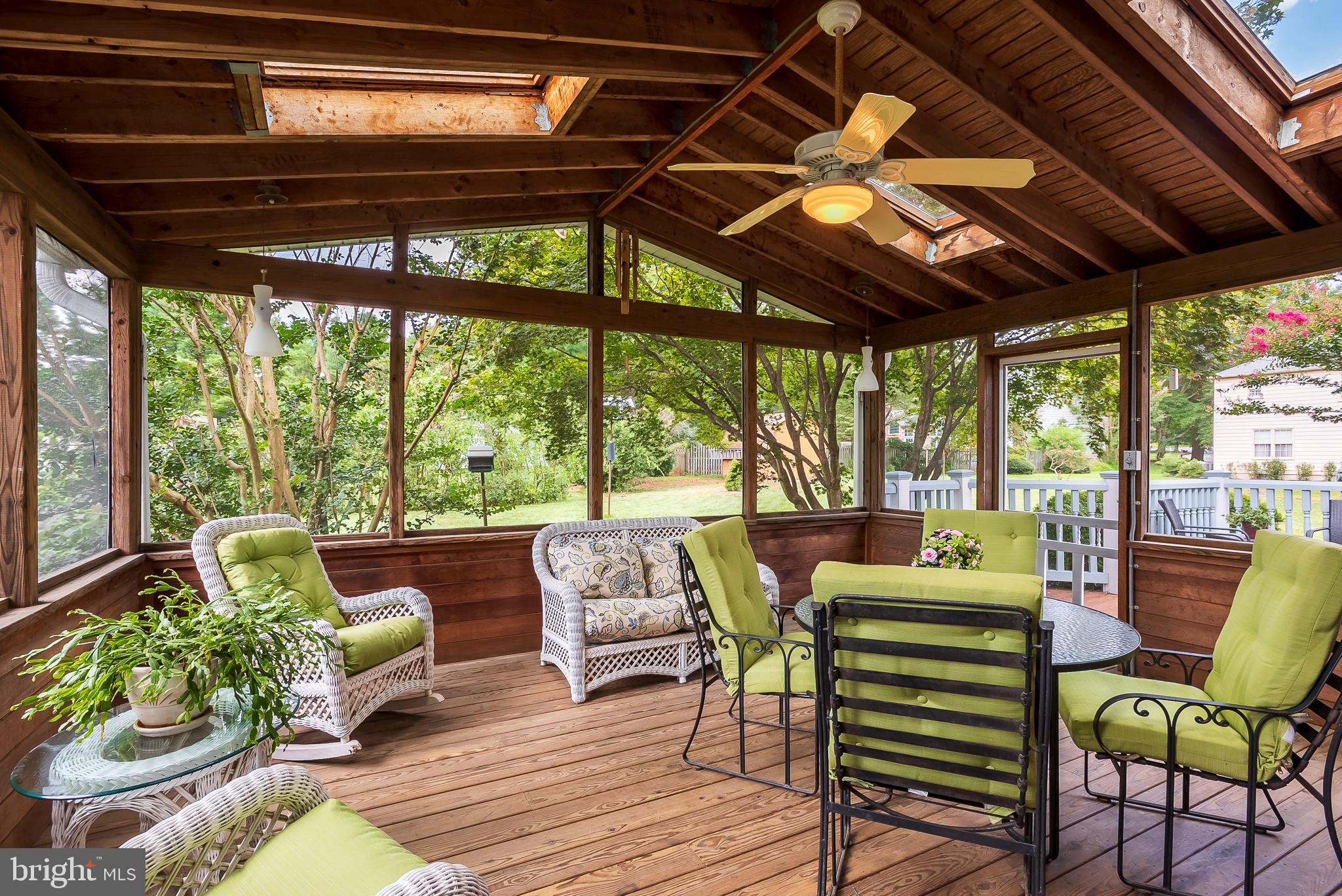5208 Durham Road East Columbia, MD 21044 - Photo 8 of 36 a patio with a patio table and chairs with a barbeque grill
