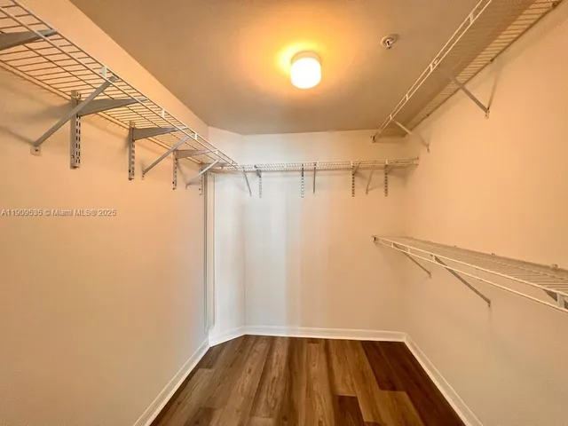 a view of a room with racks on the wall