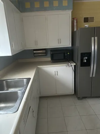 a utility room with washer and dryer