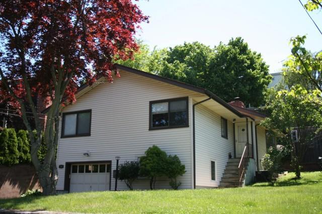 46 Gerry Street Greenwich, CT 06830 - Photo 1 of 1 a view of a house with backyard and sitting area