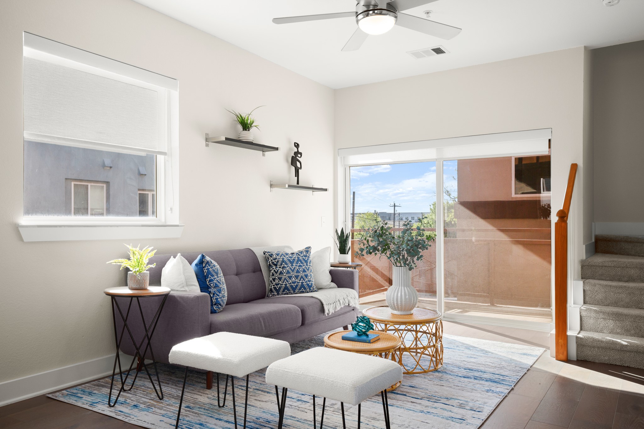 2827 Manor Road, Unit 3105 Austin, TX 78722 - Photo 2 of 26 a living room with furniture and a floor to ceiling window