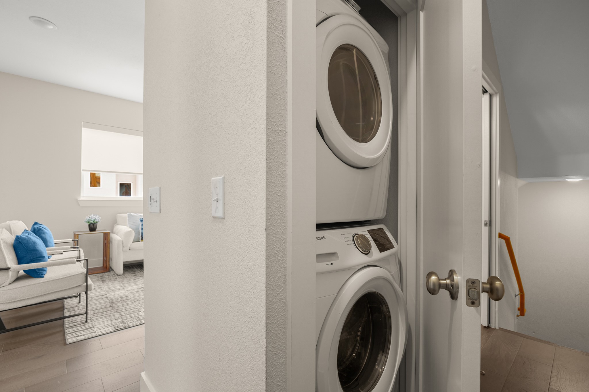 2827 Manor Road, Unit 3105 Austin, TX 78722 - Photo 23 of 26 a view of a storage and utility room with washer and dryer