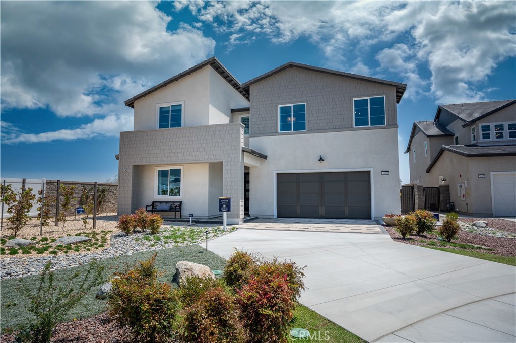 13093 Edgware Drive Rancho Cucamonga, CA 91739 - Photo 20 of 25 a front view of a house with yard and parking