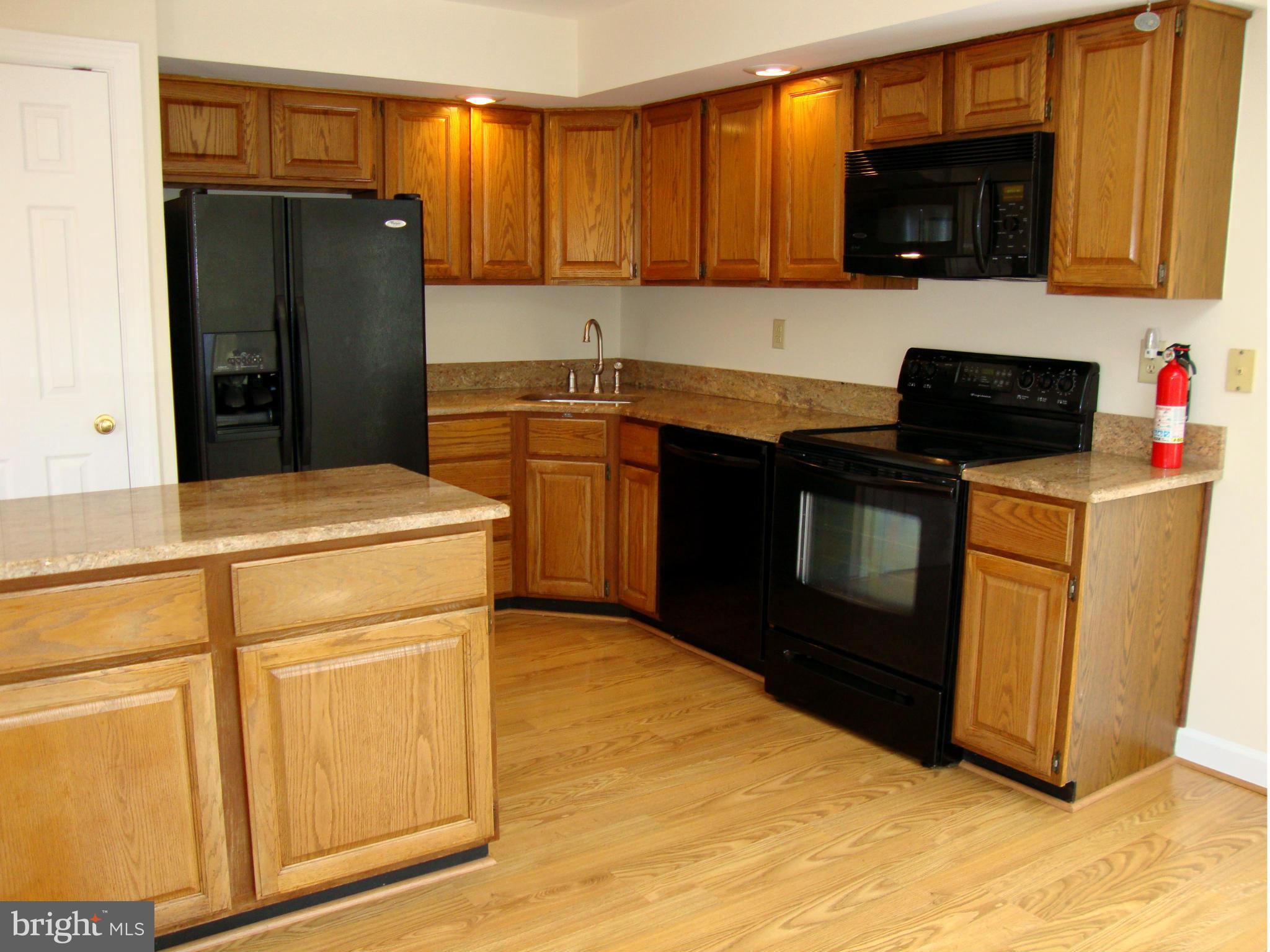 5567 Rivendell Place Frederick, MD 21703 - Photo 10 of 27 Kitchen has a Center Island