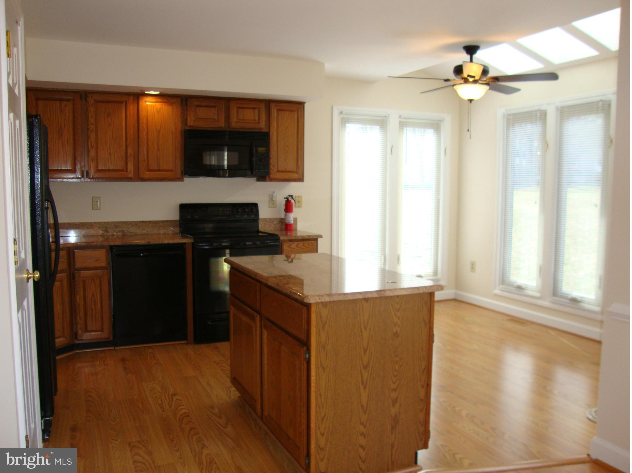 5567 Rivendell Place Frederick, MD 21703 - Photo 11 of 27 Kitchen has a Sunny Breakfast Room
