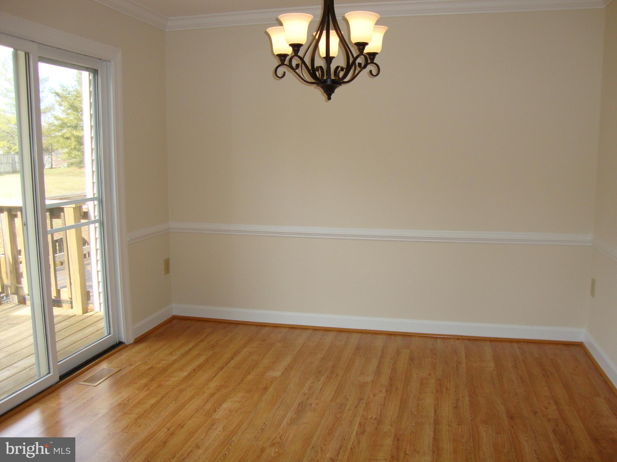 5567 Rivendell Place Frederick, MD 21703 - Photo 13 of 27 Dining Room with Crown Molding & Chair Rail