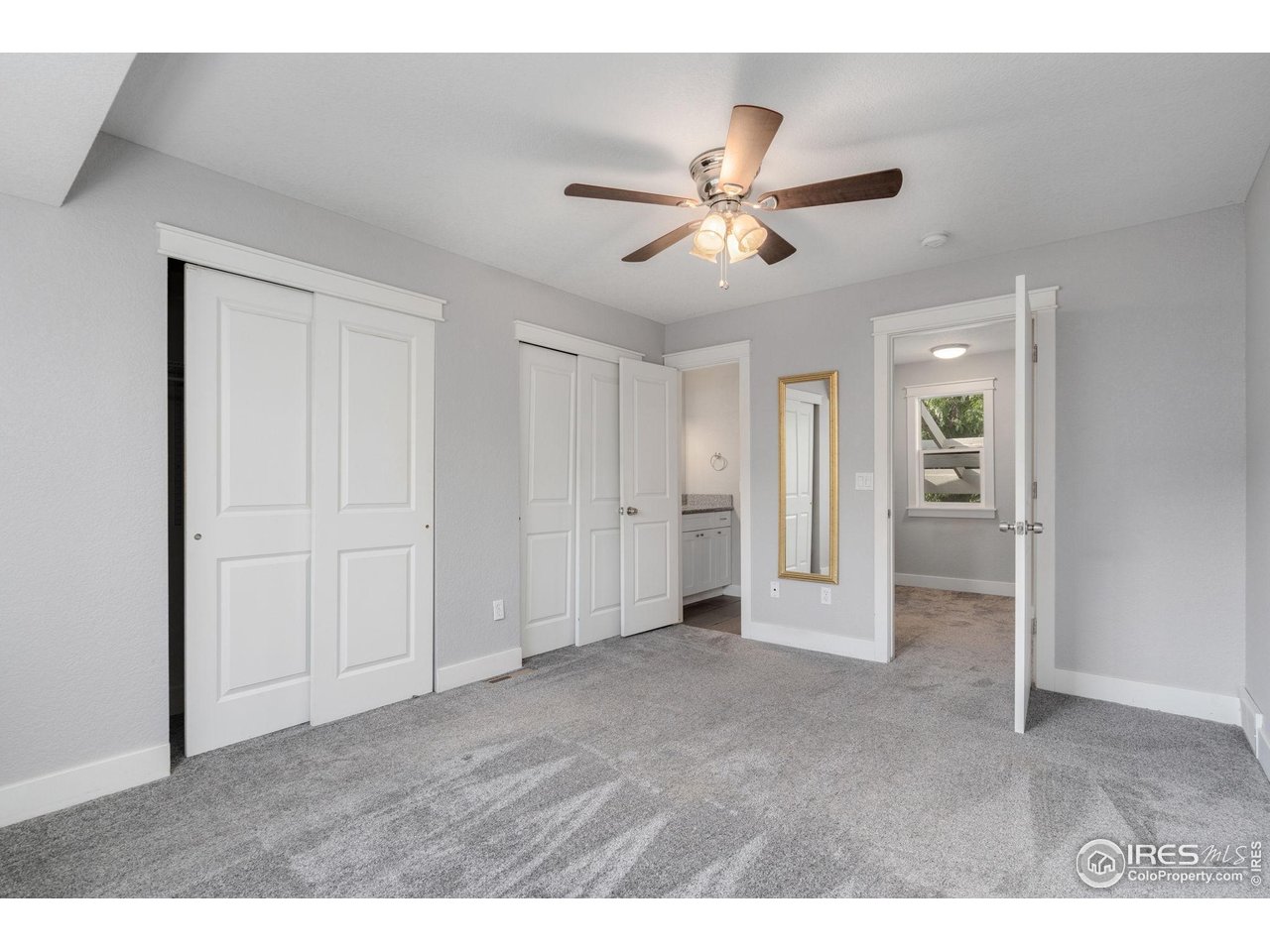 3036 Regatta Lane, Unit 2 Fort Collins, CO 80525 - Photo 11 of 22 Primary Bedroom with direct bathroom access