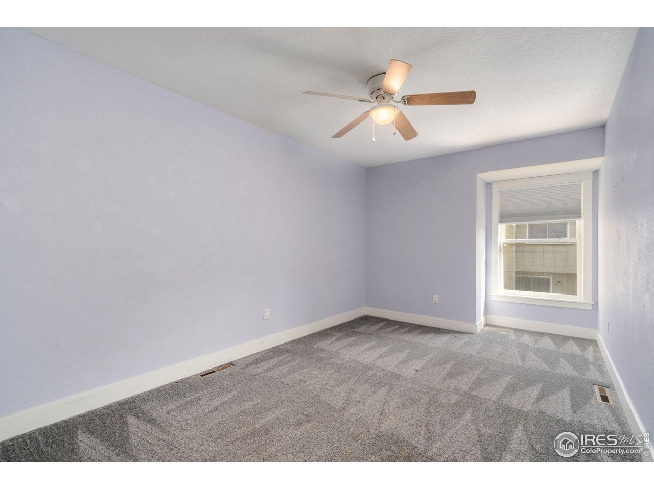 3036 Regatta Lane, Unit 2 Fort Collins, CO 80525 - Photo 13 of 22 Bedroom #2 Upstairs with ceiling fan