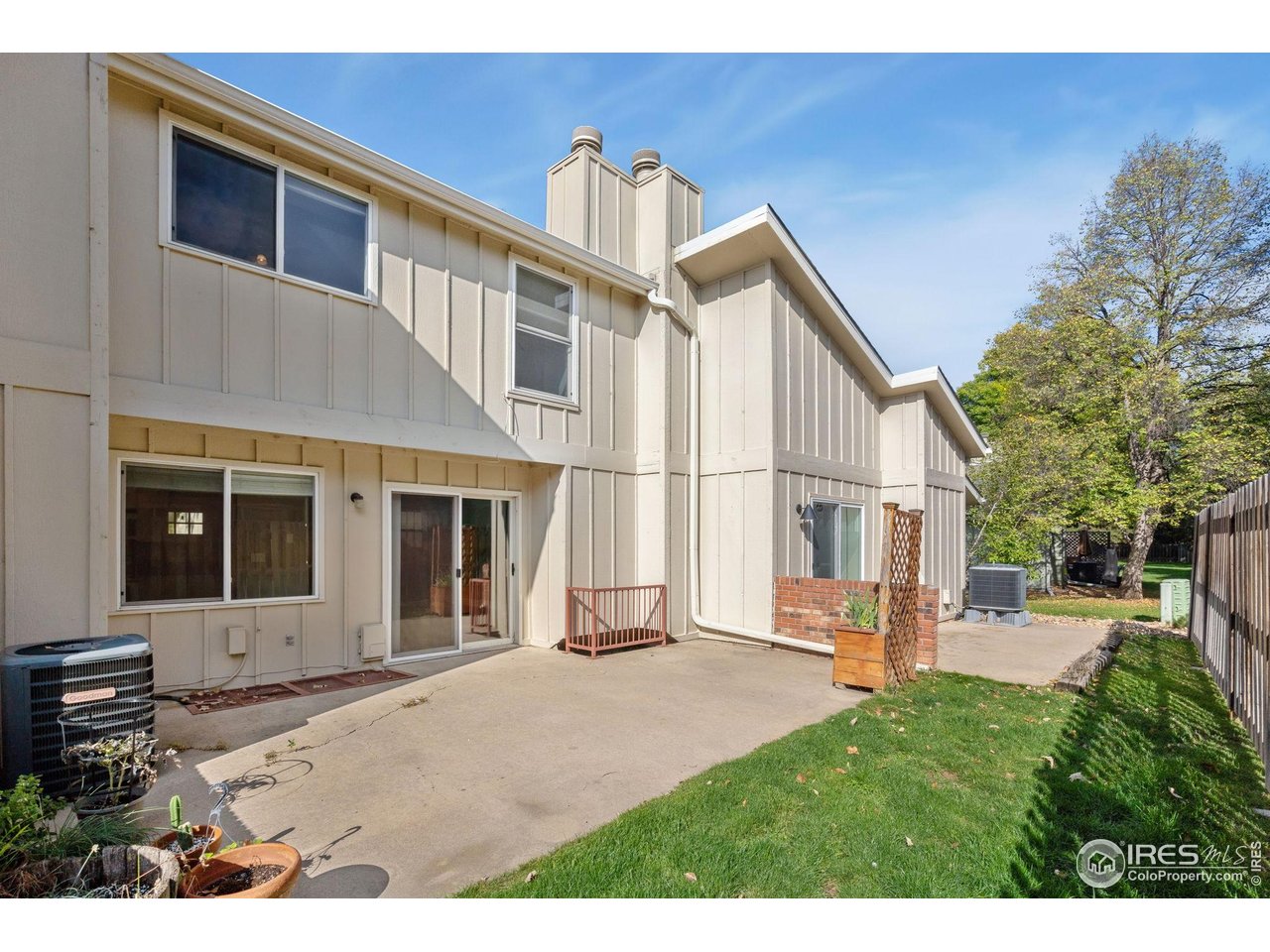 3036 Regatta Lane, Unit 2 Fort Collins, CO 80525 - Photo 16 of 22 View of the massive back patio - East Facing perfect for summer evenings