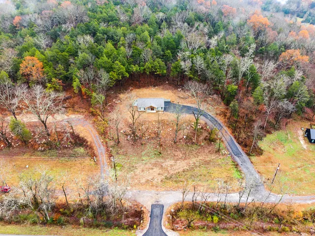 a view of swimming pool with an outdoor seating
