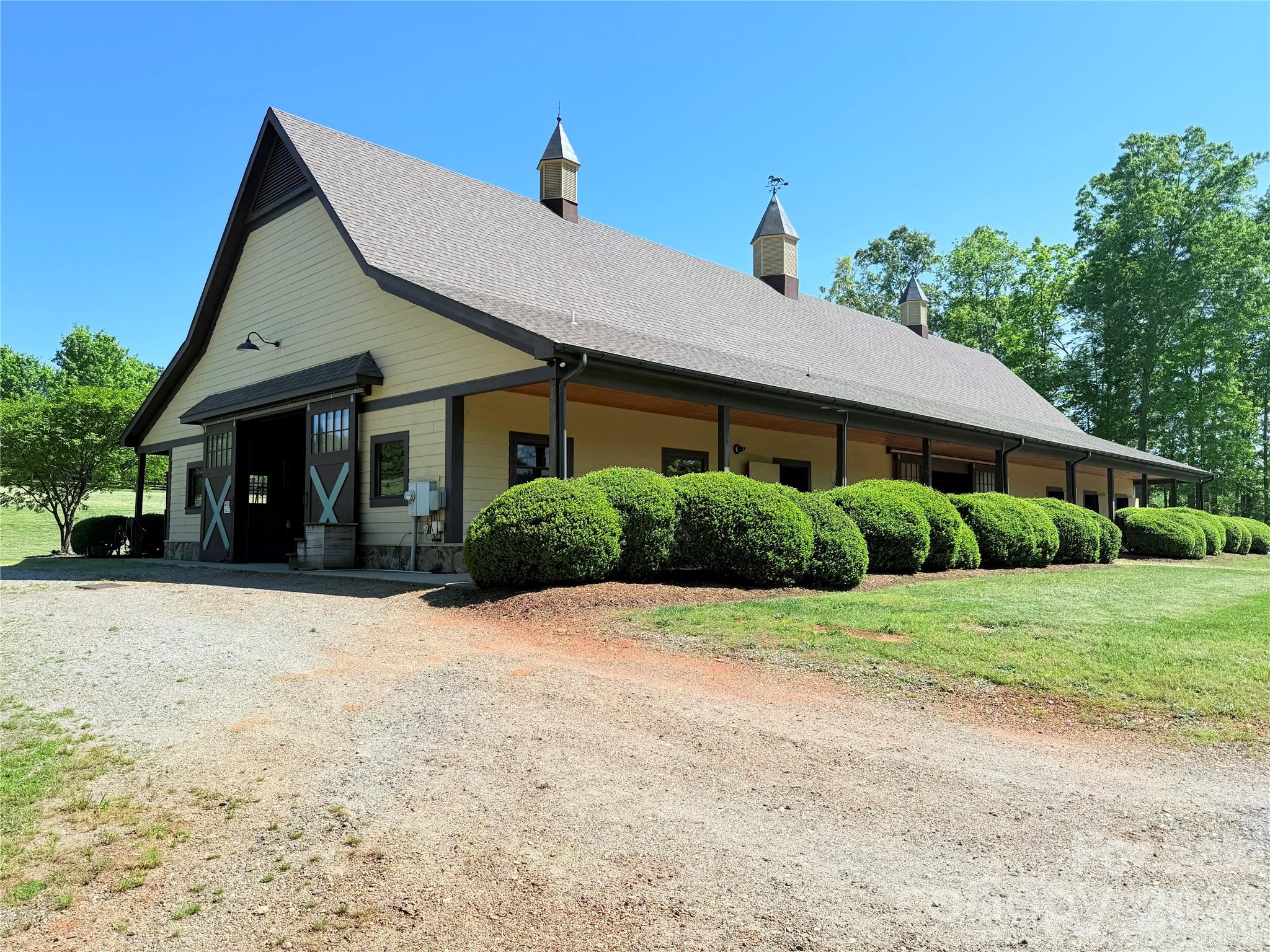 0 Mapleton Lane Columbus, NC 28722 - Photo 11 of 26 a front view of a house with a yard
