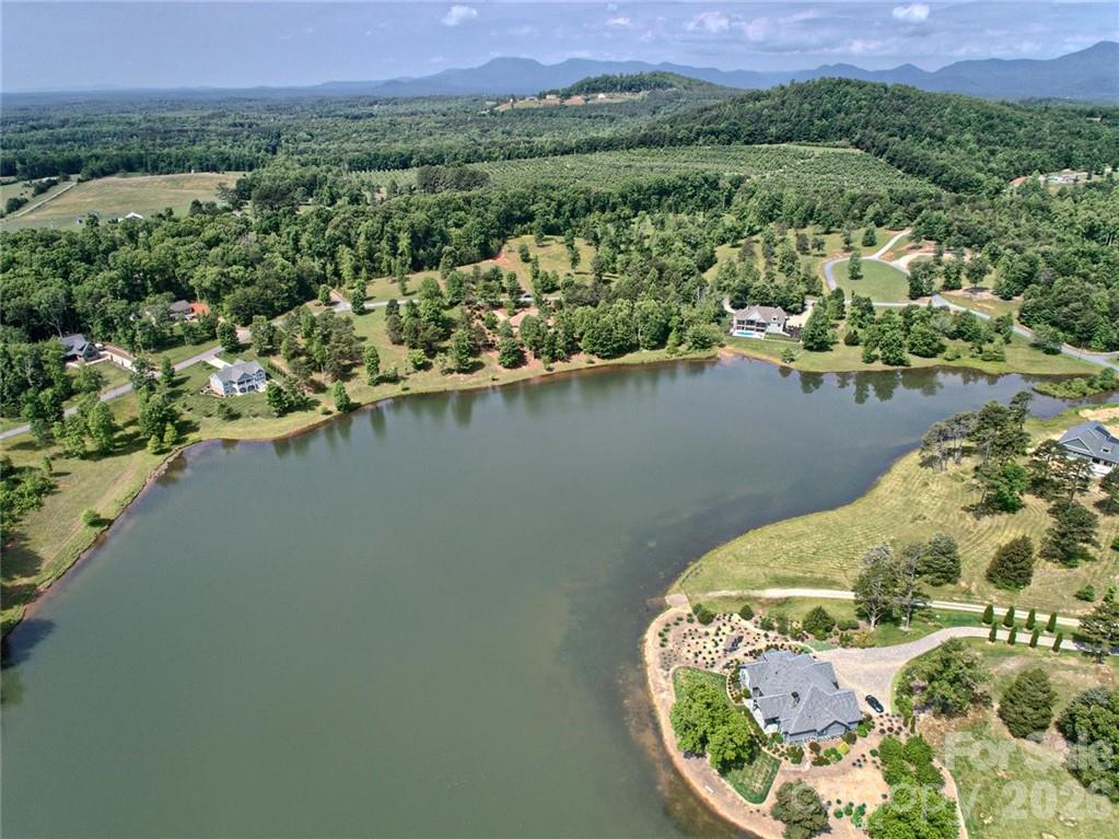 0 Mapleton Lane Columbus, NC 28722 - Photo 18 of 26 an aerial view of a house with a lake view