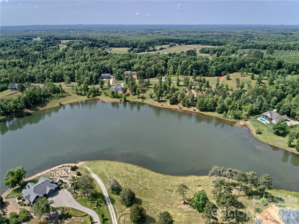 0 Mapleton Lane Columbus, NC 28722 - Photo 20 of 26 a view of a lake with a mountain in the background