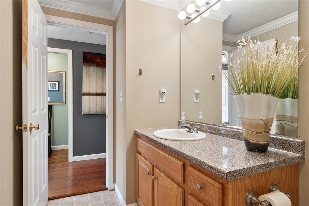 7 Green Briar Road, Unit 7 Fitchburg, MA 01420 - Photo 18 of 34 a bathroom with a granite countertop sink a toilet and shower