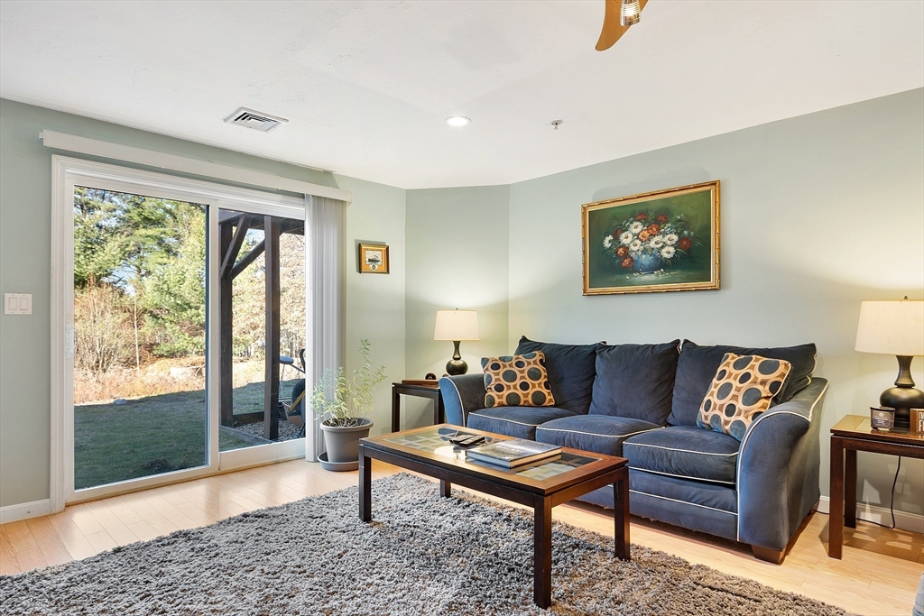 7 Green Briar Road, Unit 7 Fitchburg, MA 01420 - Photo 29 of 34 a living room with furniture and a window