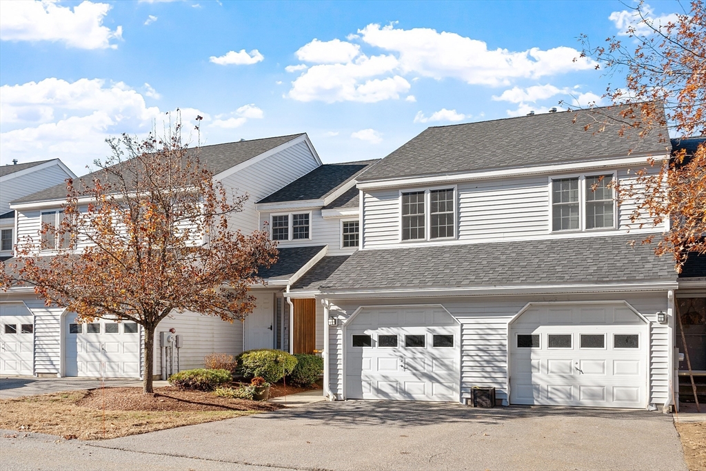 7 Green Briar Road, Unit 7 Fitchburg, MA 01420 - Photo 31 of 34 a front view of a house with a garden
