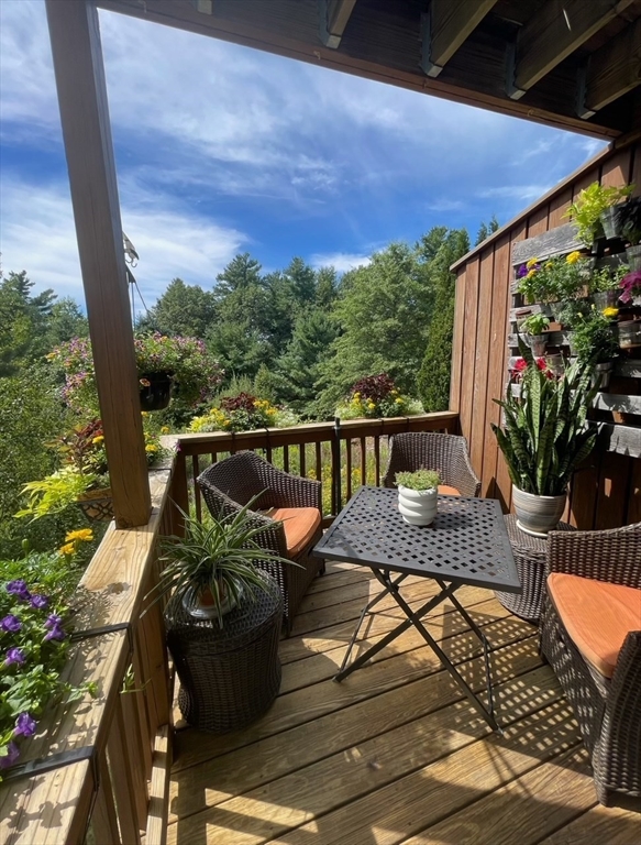 7 Green Briar Road, Unit 7 Fitchburg, MA 01420 - Photo 33 of 34 a view of a balcony with furniture
