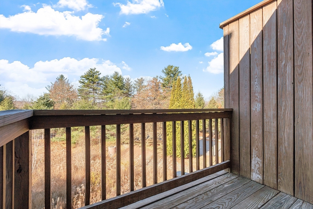 7 Green Briar Road, Unit 7 Fitchburg, MA 01420 - Photo 34 of 34 a view of a balcony with wooden floor