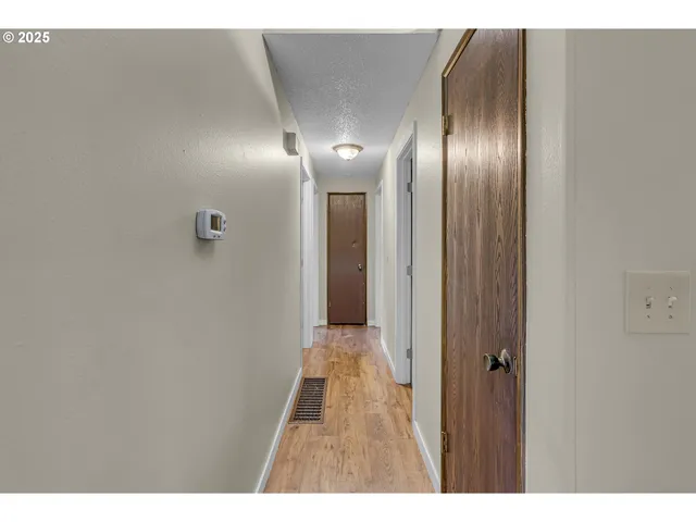 a view of hallway with stairs