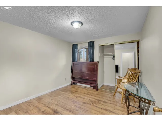 a view of a livingroom with furniture and furniture
