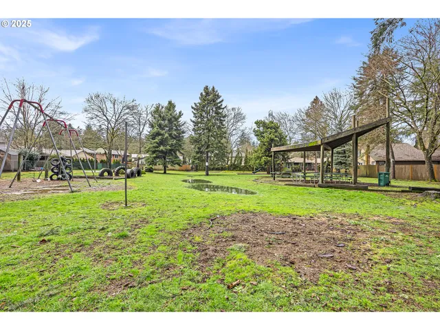 a view of a house with a big yard