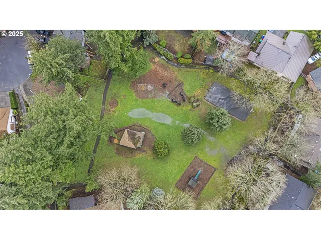 a view of a garden with a lake
