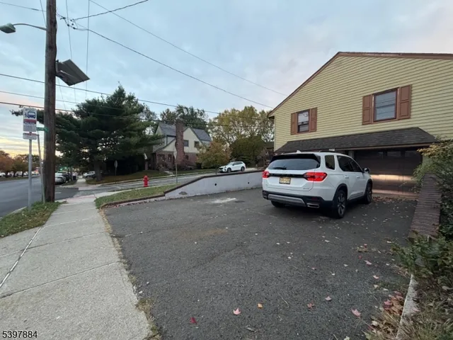 a car parked in front of a house