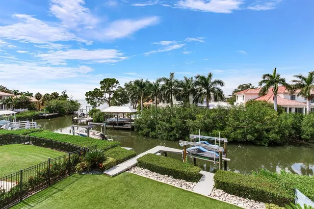 a view of a chairs and table in the patio