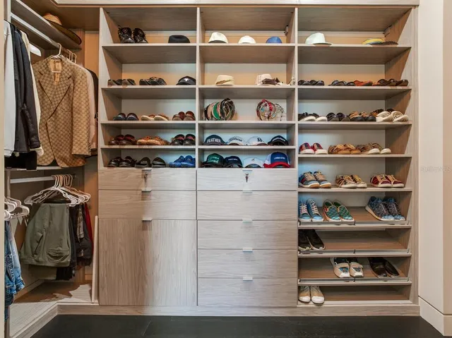 a room with wooden floor and a window