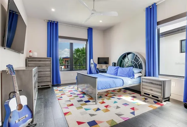 a view of a balcony with yard