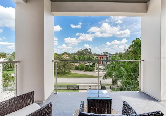 a view of a lake with sitting area