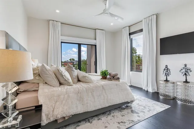 an aerial view of a house with a garden and outdoor space