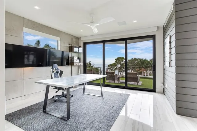aerial view of a house with a swimming pool yard and outdoor seating